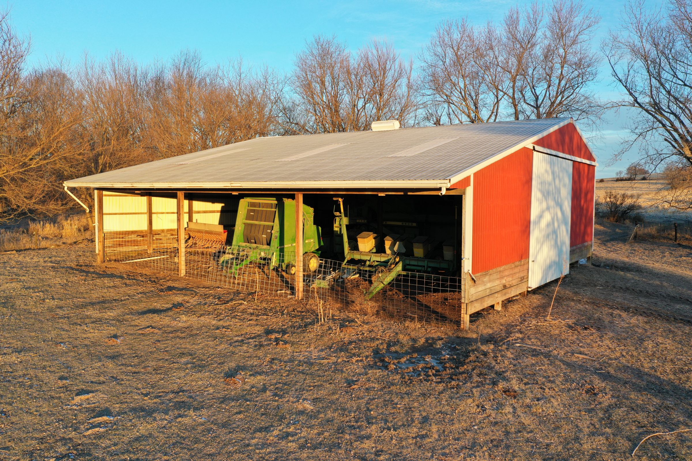 Functional and well-maintained open front cattle and machine shed that measures approximately 53 ft. x 47 ft in Guthrie Center, Iowa