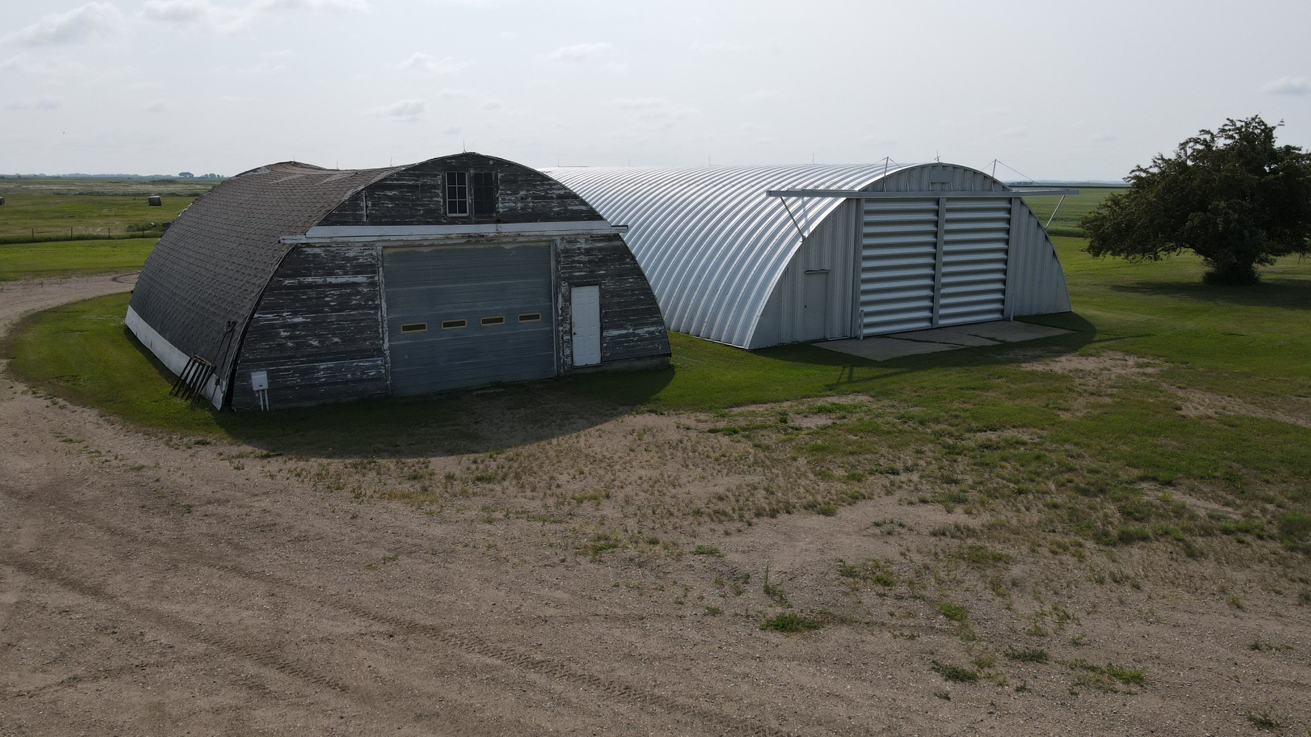 Steel Quonset & wood shed